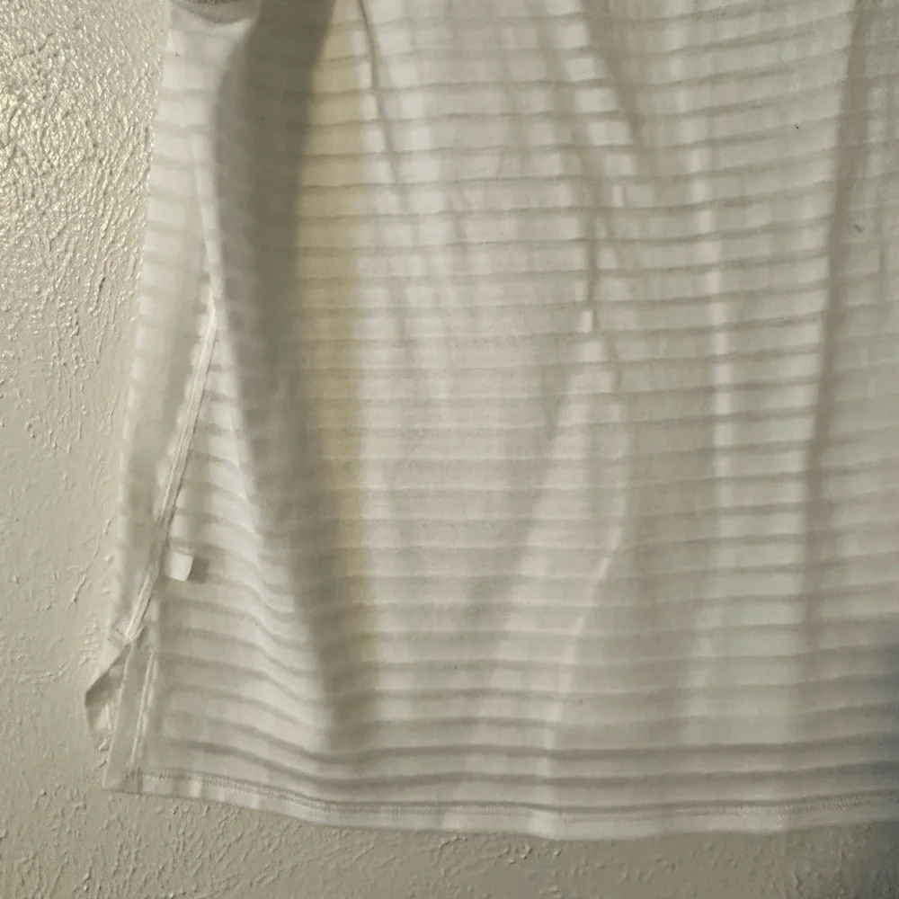 Lululemon Uncovered Muscle Tank
White​​​​ - Picture 8 of 8